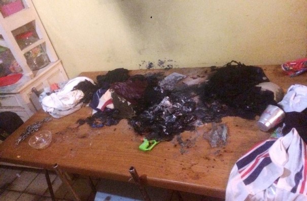 Mulher � presa ap�s atear fogo no carro e na casa do ex-companheiro