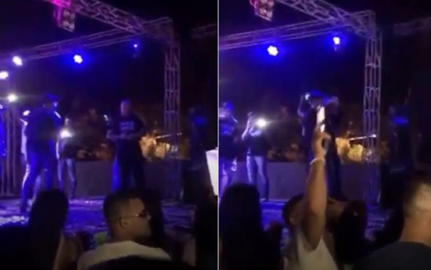 Rapaz com arma � flagrado em v�deo em aglomera��o de festa em Tup�