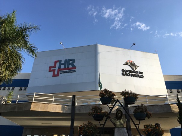 Homem morre no HR ap�s ser atingido por v�rios tiros em port�o de resid�ncia