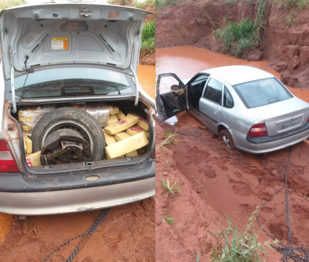 Em carro com mais de 200kg de drogas, casal tenta escapar de abordagem policial, mas fica atolado em lamaçal e acaba preso